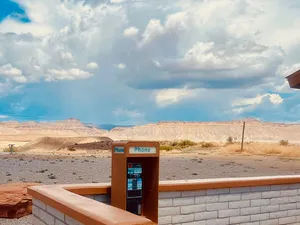 Rest stop payphone with mesas in the background