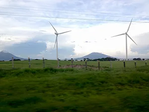 Windmills and distant mountains