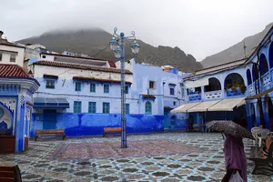 Plaza surrounded by blue buildings