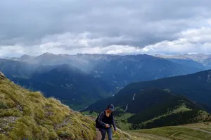 Woman hiking with view of Pyrenees