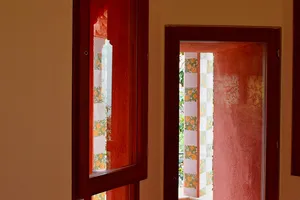 Doorway and reflection in Casa Vicens