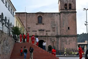 Kids in red track suits on steps