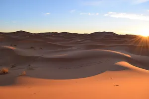 Sunset over sand dunes