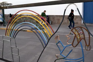 Rainbow sculpture road divider