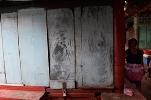 Wooden door of a closed mercado shop