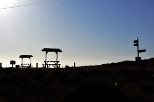 Silhouettes of signs and benches