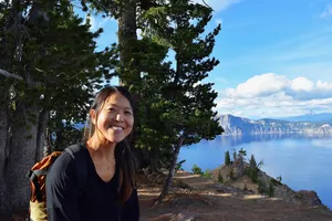 Smiling woman above Crater Lake