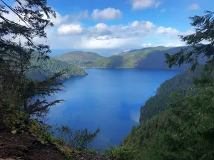 A bright blue alpine lake