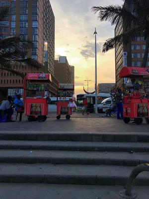 Sunset behind snack vendors in Durban