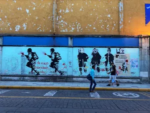 Street art featuring soldiers in riot gear